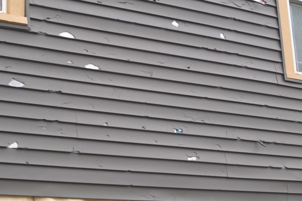 Damaged Siding Replacement in Huntington Station