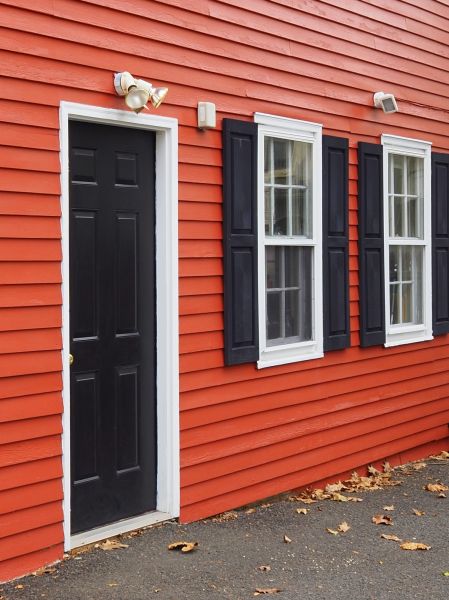 Red Vinyl Siding Installation in Huntington Station
